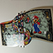 Dollar Mario : Dollar Mario est une œuvre d'art entièrement réalisée à la main en Technique mixte sur aluminium, acrylique, résinée pour un rendu de haute intensité des couleurs, 
un effet de brillance et une protection durable de la création. 